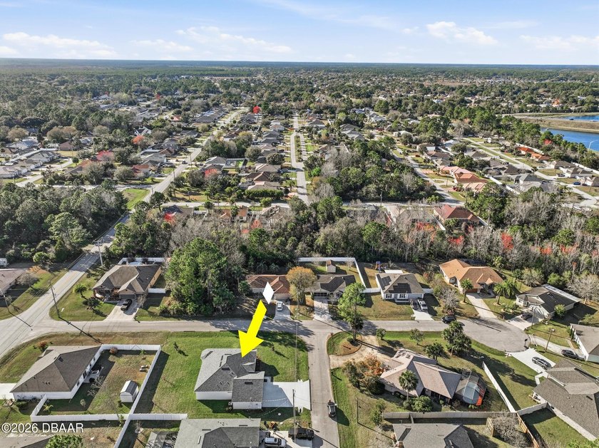 Enjoy spacious living with 10-foot ceilings and a bright, open - photo 12