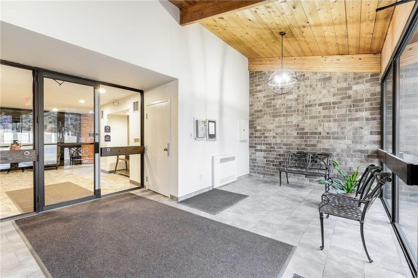 OWN for LESS than Rent! Top-floor living at Lochmoor! Enjoy the - photo 4