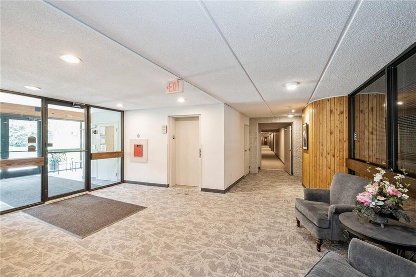 OWN for LESS than Rent! Top-floor living at Lochmoor! Enjoy the - photo 5