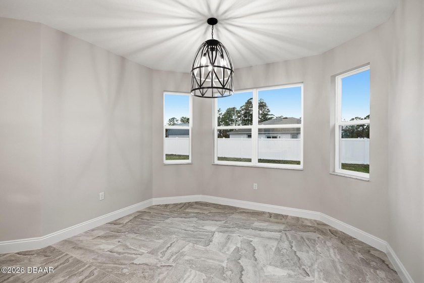 Enjoy spacious living with 10-foot ceilings and a bright, open - photo 46