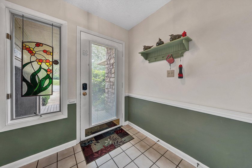 Experience carefree lake living in this beautifully maintained - photo 13