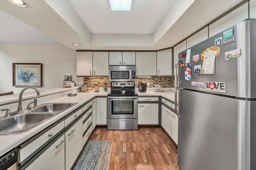 Experience carefree lake living in this beautifully maintained - photo 17