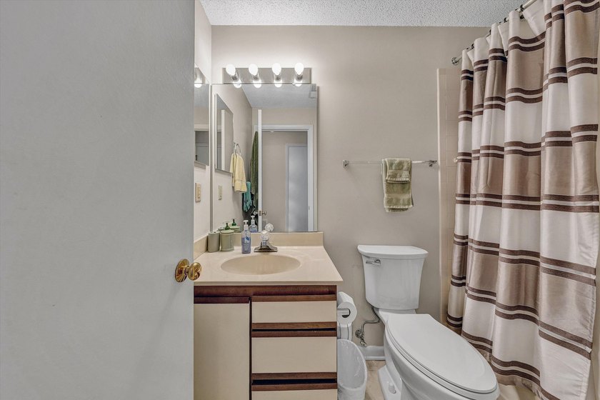 Experience carefree lake living in this beautifully maintained - photo 40