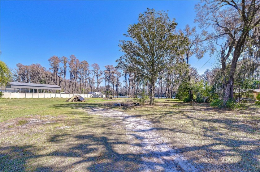 Opportunity to own 3 private acres on beautiful Wisteria Lake in - photo 6