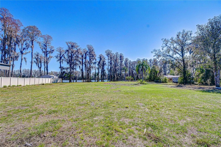 Opportunity to own 3 private acres on beautiful Wisteria Lake in - photo 10