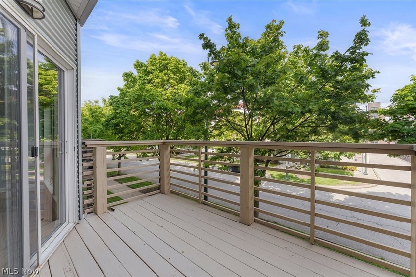 Welcome to 1266 West 74th. A three story townhome on a - photo 11