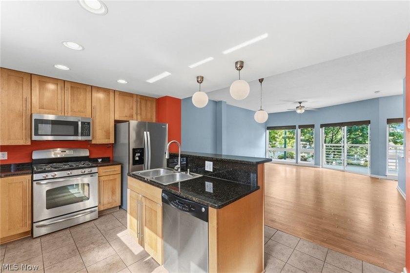 Welcome to 1266 West 74th. A three story townhome on a - photo 12