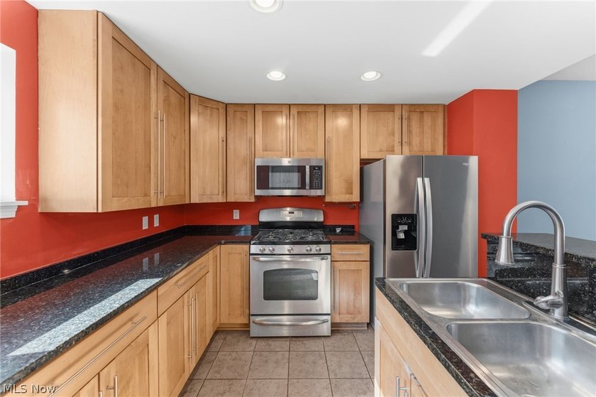 Welcome to 1266 West 74th. A three story townhome on a - photo 13