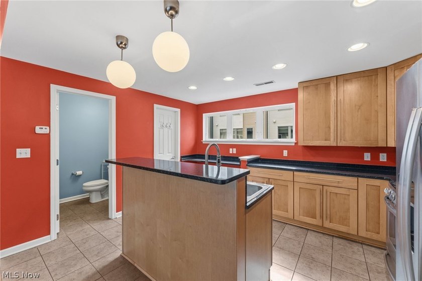 Welcome to 1266 West 74th. A three story townhome on a - photo 14