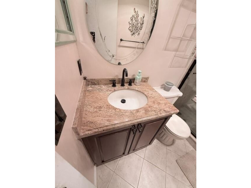 Welcome to this charming two-bedroom, one-and-a-half-bath - photo 14