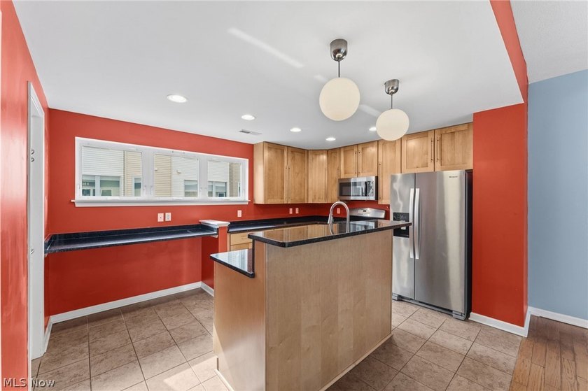 Welcome to 1266 West 74th. A three story townhome on a - photo 15