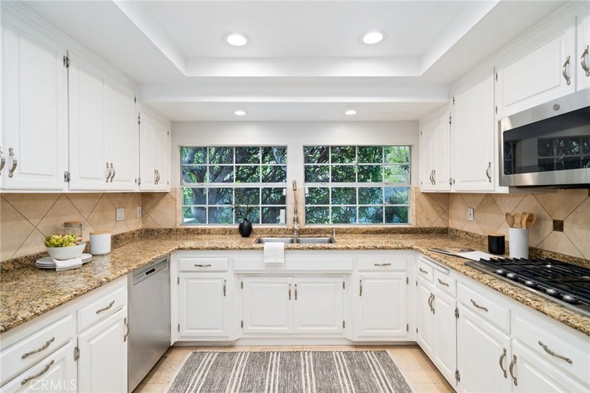 Welcome to this beautifully maintained and move-in-ready home in - photo 9