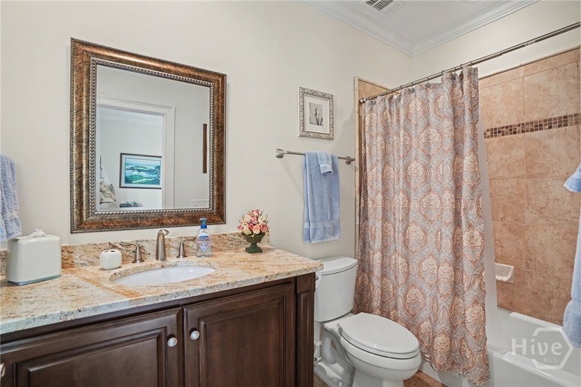 Welcome to 126 Saltwater Way, where low-maintenance living meets - photo 26