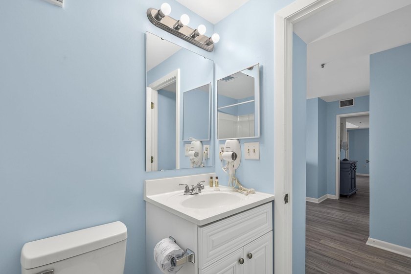 Experience coastal living at its finest in this beautifully - photo 24