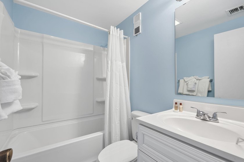Experience coastal living at its finest in this beautifully - photo 25