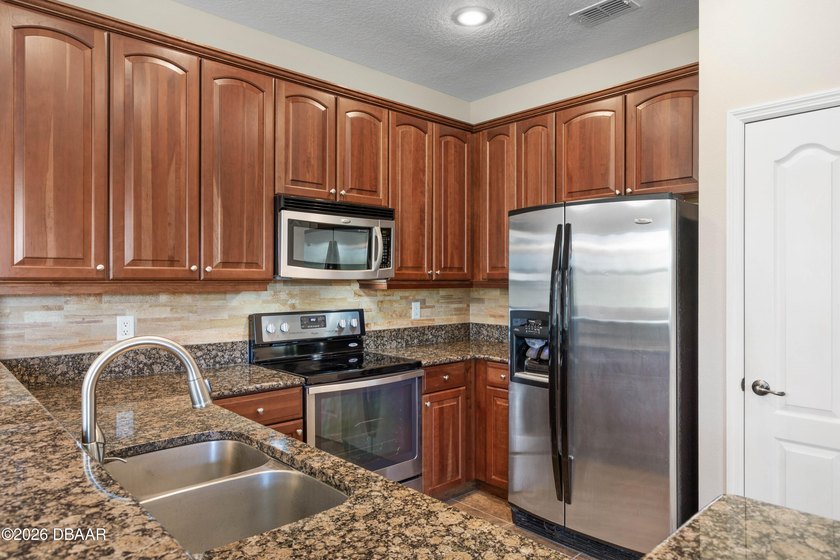 Perched on the top floor for ultimate privacy, this beautifully - photo 24