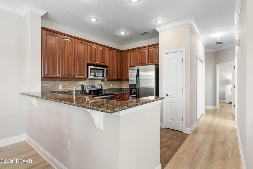 Perched on the top floor for ultimate privacy, this beautifully - photo 28