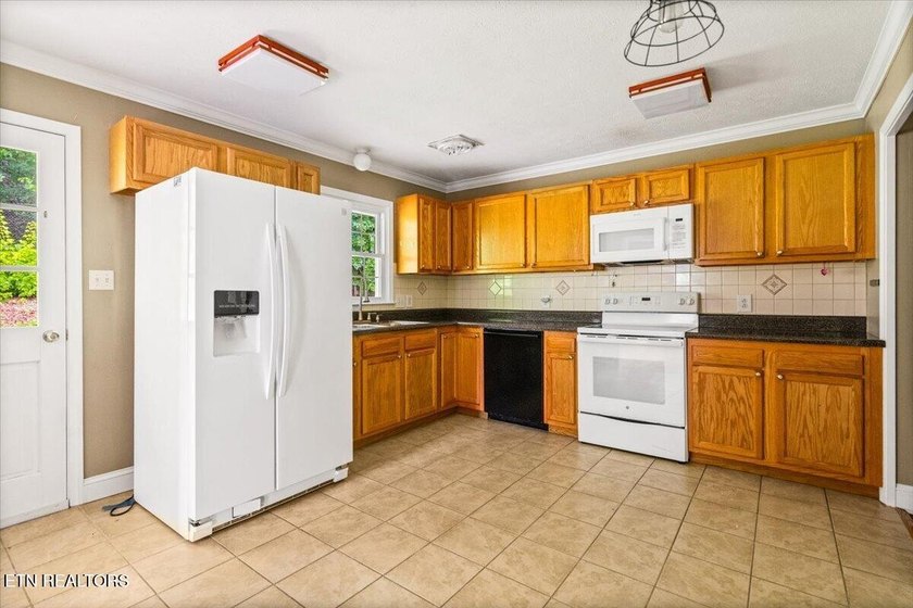 WOW! This home is perfectly situated in the Country Club and - photo 16