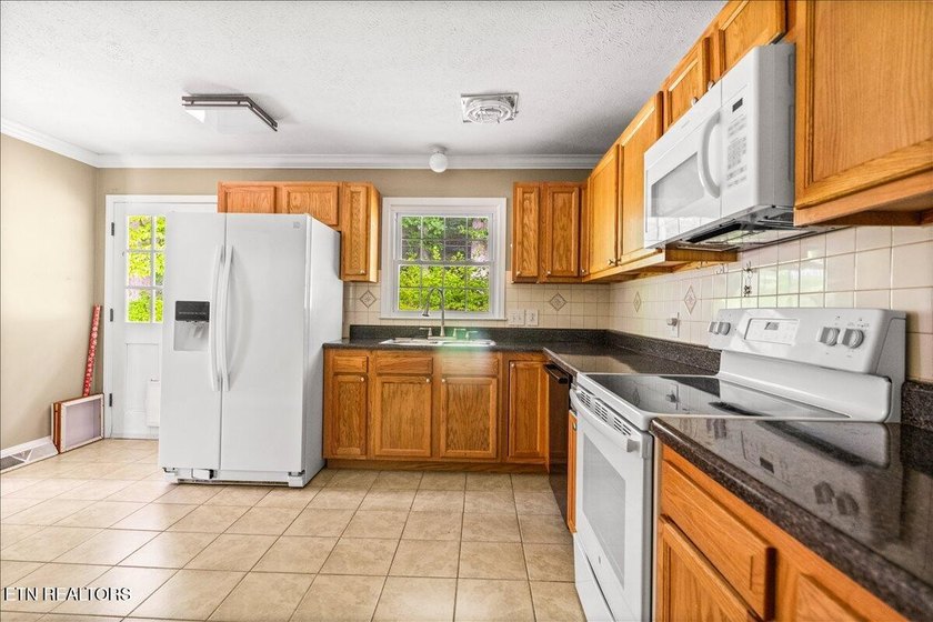WOW! This home is perfectly situated in the Country Club and - photo 17
