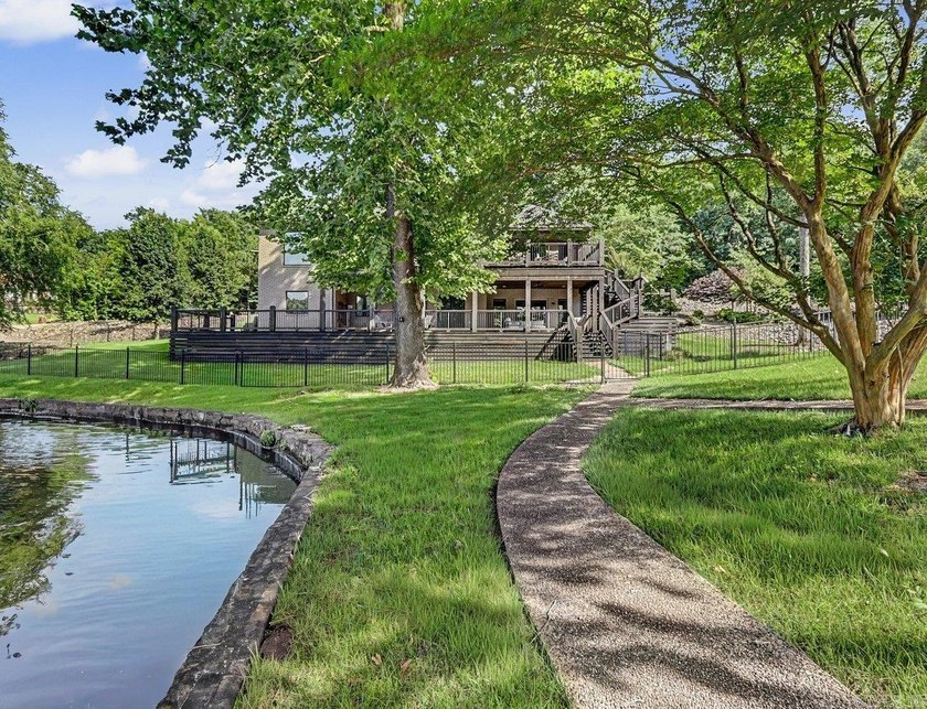 Beautifully updated lakefront home tucked away on a quiet cove - photo 37
