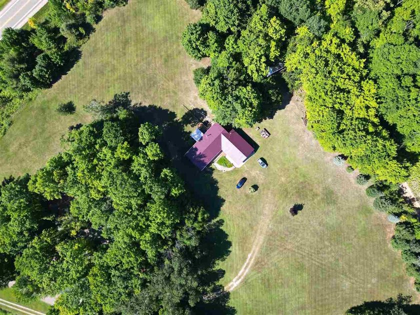 Ideally situated between Boyne City and Charlevoix, this - photo 2