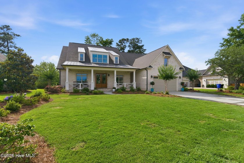 Welcome to this exceptional 4 bedroom, 4 bath custom home in the - photo 2