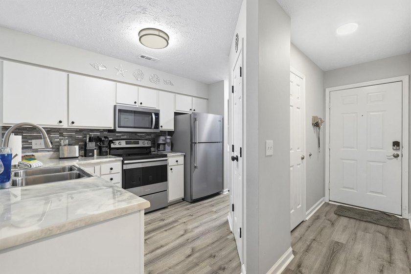 Welcome to effortless coastal living in the beautifully updated - photo 11