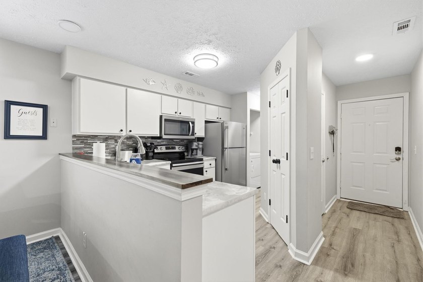 Welcome to effortless coastal living in the beautifully updated - photo 12