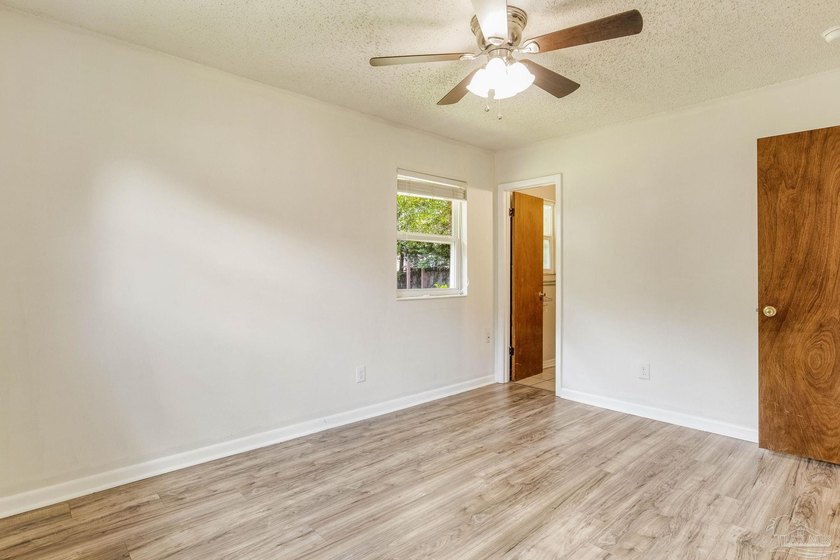 Step into the delightful 3-bedroom, 2-bath haven nestled in the - photo 13