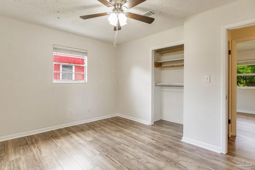 Step into the delightful 3-bedroom, 2-bath haven nestled in the - photo 16