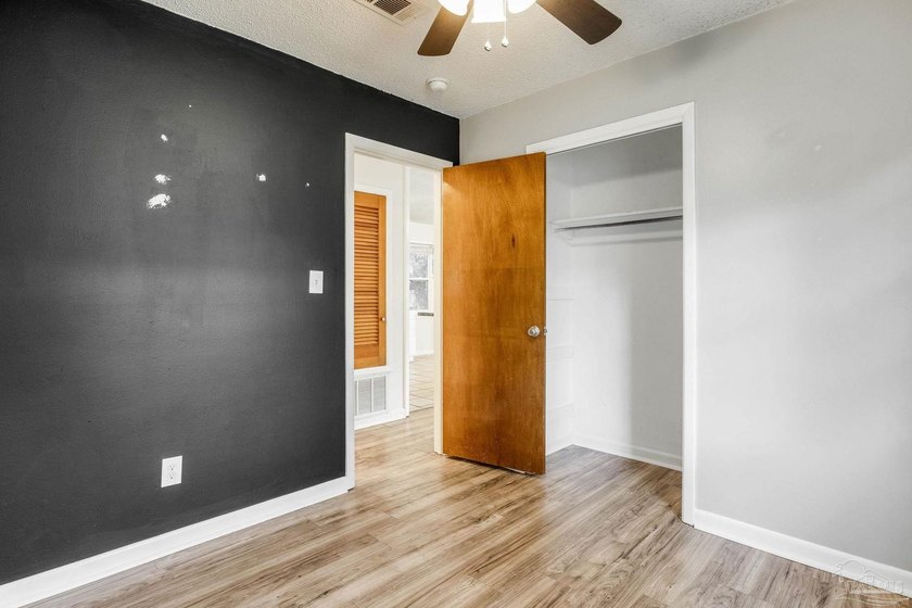 Step into the delightful 3-bedroom, 2-bath haven nestled in the - photo 20