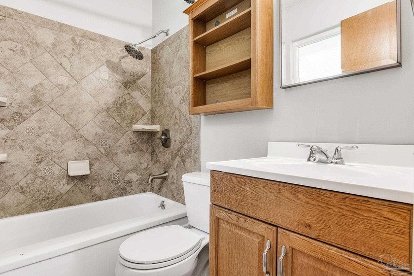 Step into the delightful 3-bedroom, 2-bath haven nestled in the - photo 22