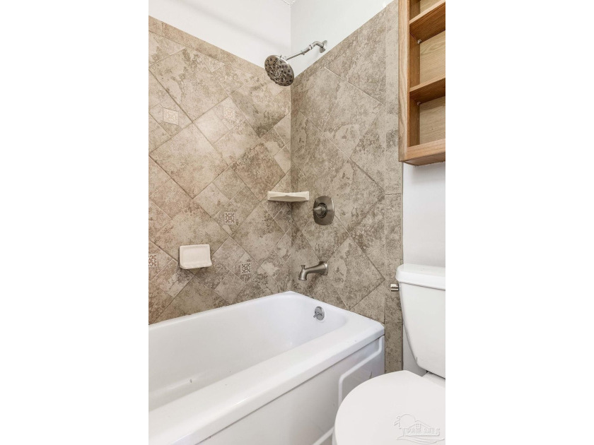 Step into the delightful 3-bedroom, 2-bath haven nestled in the - photo 24