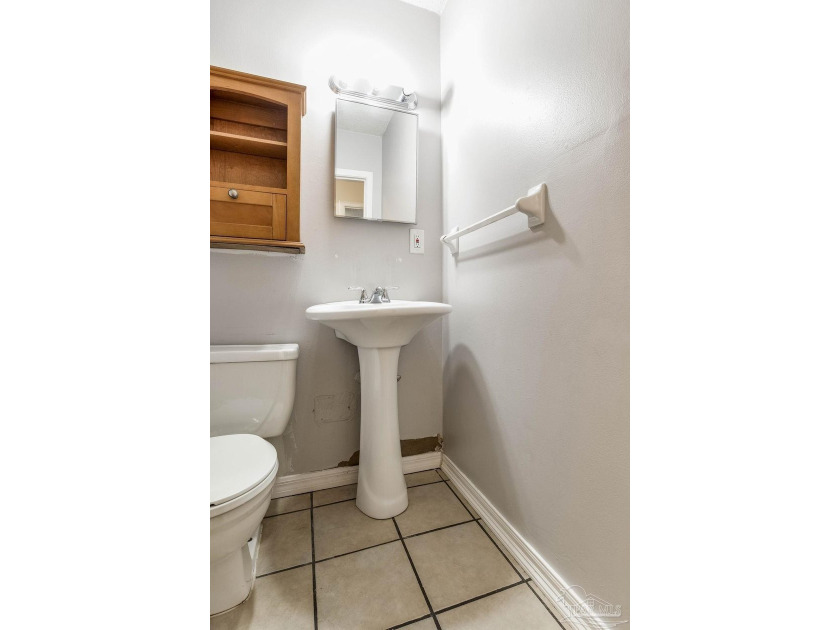 Step into the delightful 3-bedroom, 2-bath haven nestled in the - photo 25