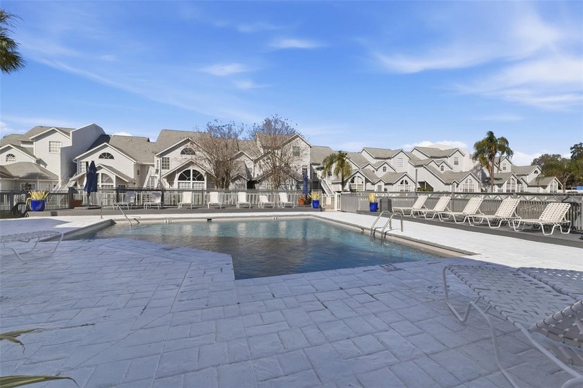 Welcome to this ground-floor, corner-unit condo that offers an - photo 26