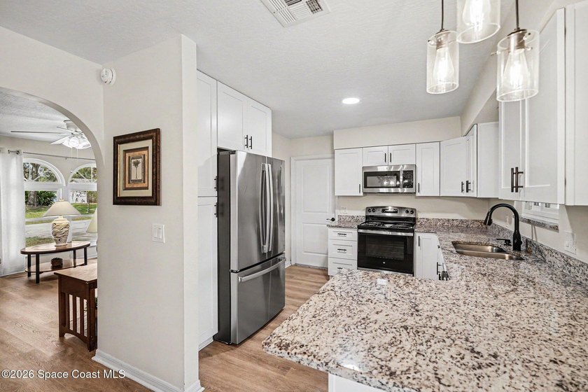 This exceptional 3-bed, 2-bath home in NW Palm Bay offers an - photo 8