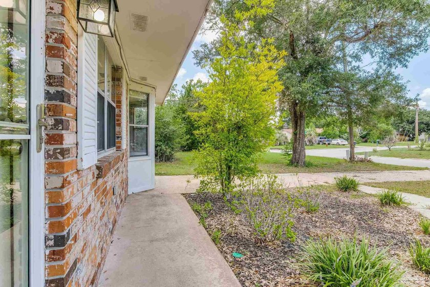 Step into the delightful 3-bedroom, 2-bath haven nestled in the - photo 30