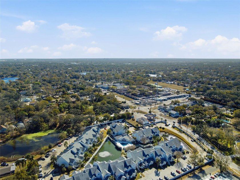 Welcome to this ground-floor, corner-unit condo that offers an - photo 34