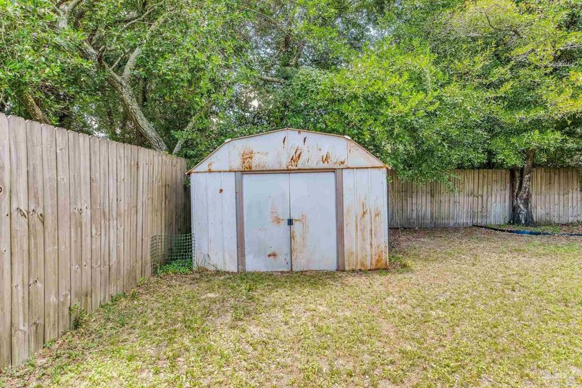 Step into the delightful 3-bedroom, 2-bath haven nestled in the - photo 41