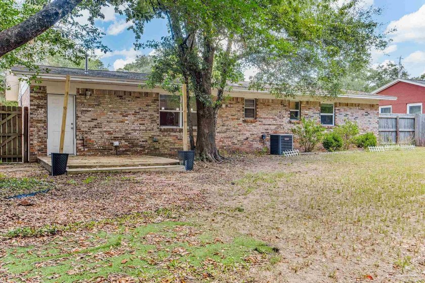 Step into the delightful 3-bedroom, 2-bath haven nestled in the - photo 47