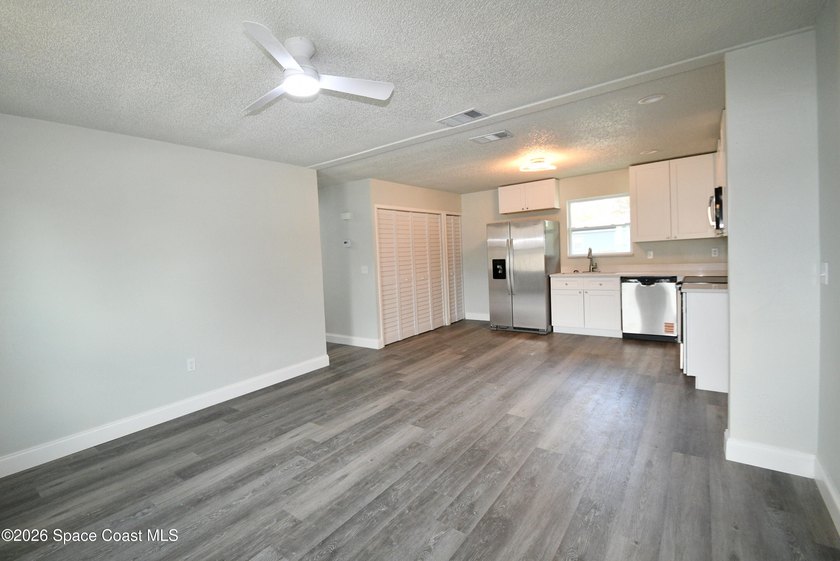 This updated Palm Bay home is set just off a main road, making - photo 9