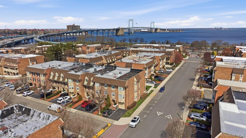 Welcome to The Baybridge, a private gated condominium community - photo 3