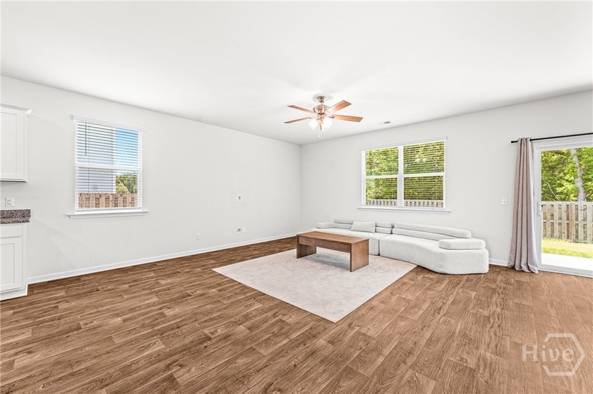 Welcome to this beautiful 4-bedroom, 2-bath home featuring an - photo 24