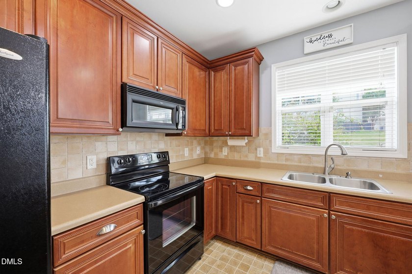 Welcome to this spacious 4-bedroom, 2.5-bath home in the - photo 13