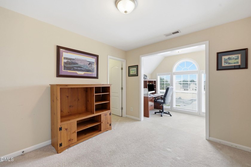 Welcome to this spacious 4-bedroom, 2.5-bath home in the - photo 23