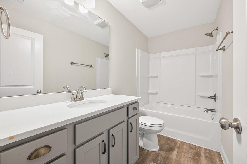 Nearly new 4-bedroom, 3-bathroom home in the gated, natural gas - photo 34