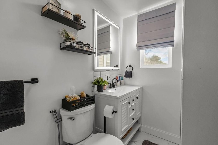Welcome to this charming single-family home nestled on an - photo 11