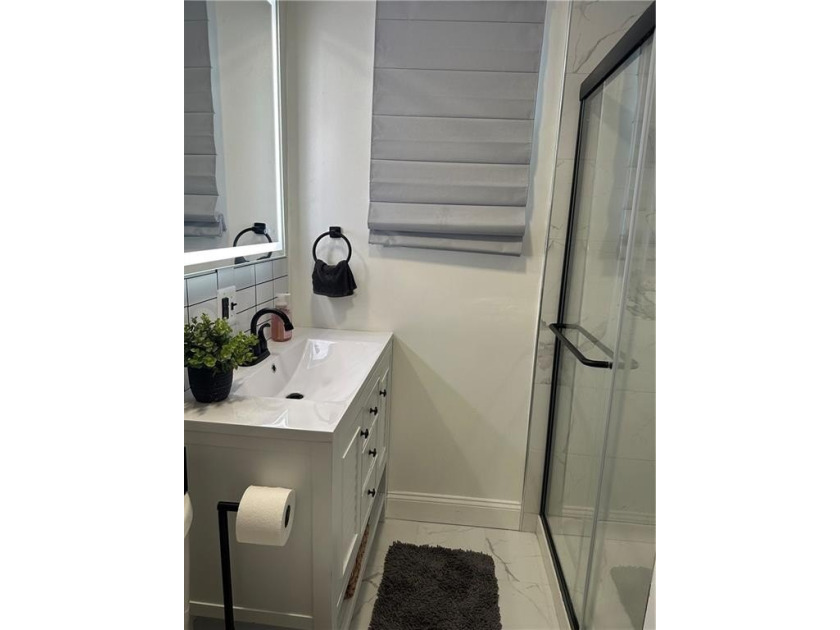 Welcome to this charming single-family home nestled on an - photo 14