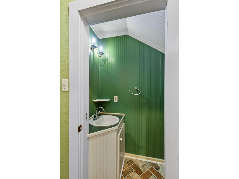 Hidden beneath towering hardwoods on a private wooded setting - photo 20