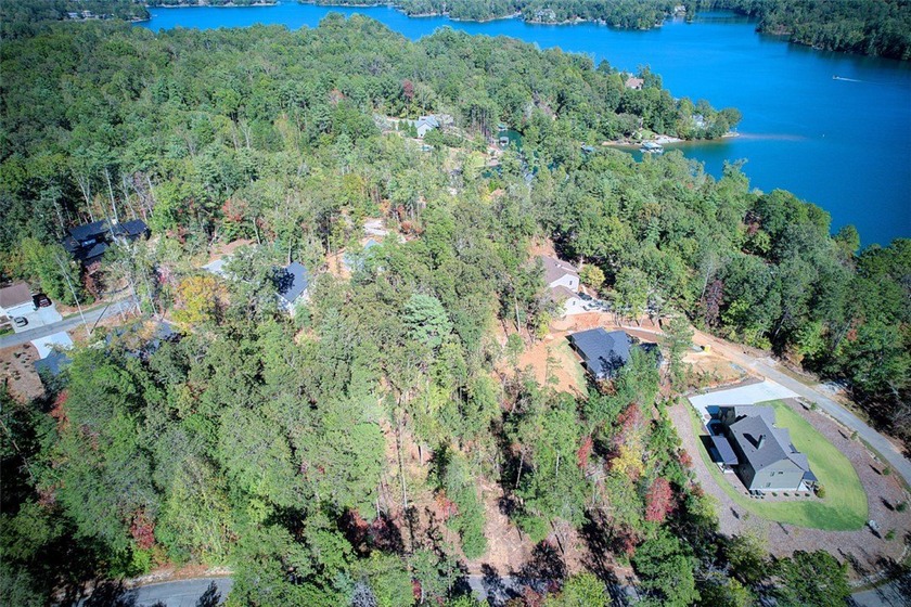 Nestled in the serene Keowee Bay subdivision, this exceptional - photo 3